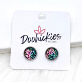 Bright Leopard Singles in Stainless Steel Settings