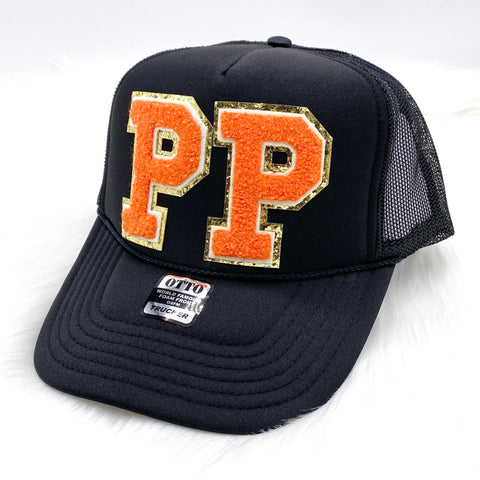 Solid Black Spirit Chenille Trucker Hat: Orange "PP"